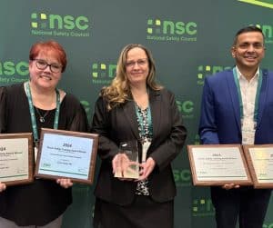 Jennifer Tittle, Davida Taube, and John Carvalho of ACNSC posing with awards. 