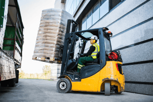 driver operating a forklift outdoors